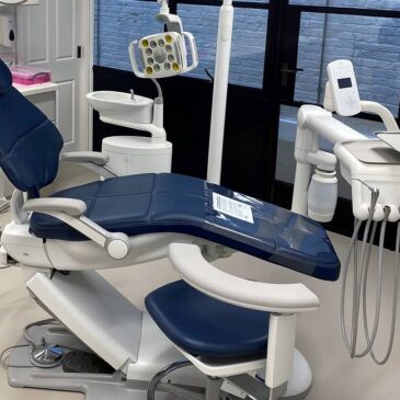 Dental surgery room with chair and equipment