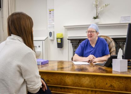 dermatology consultant with patient